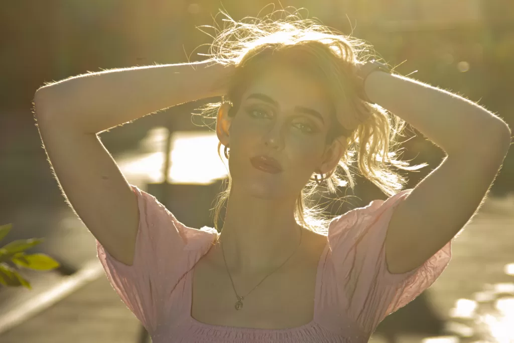 Portrait of a beautiful lady backlit by the sun